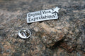 Beyond Your Expectations Lapel Pin