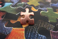 Puzzle Piece Copper Lapel Pin