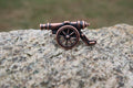 Cannon Copper Lapel Pin
