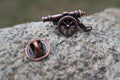 Cannon Copper Lapel Pin