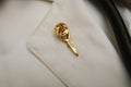 Aneurysm Clip Gold Lapel Pin
