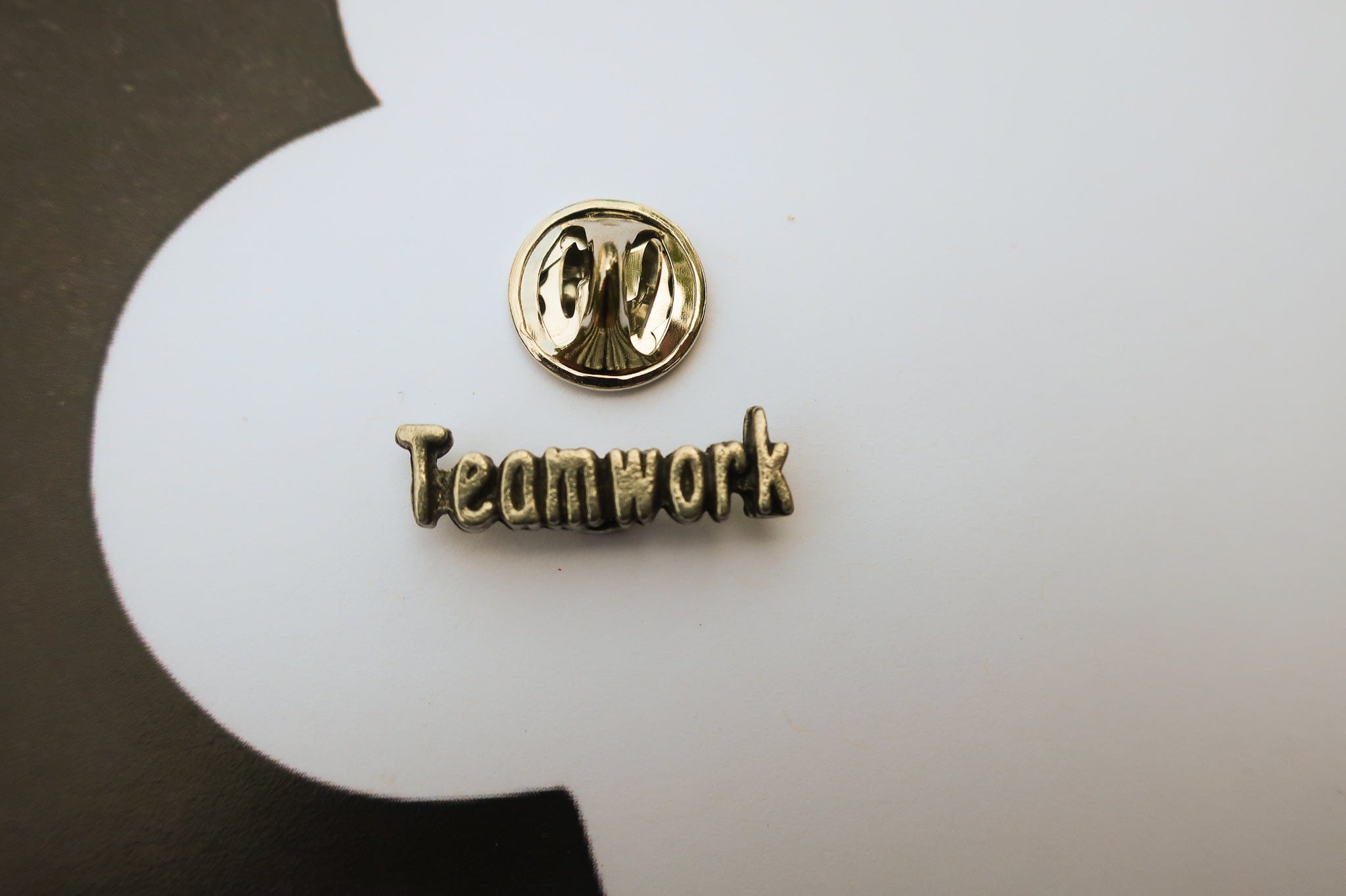 Teamwork Lapel Pin – lapelpinplanet