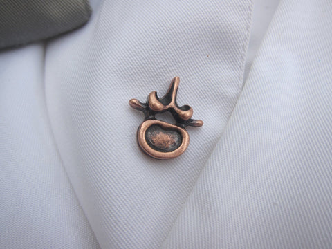 Vertebra Copper Lapel Pin